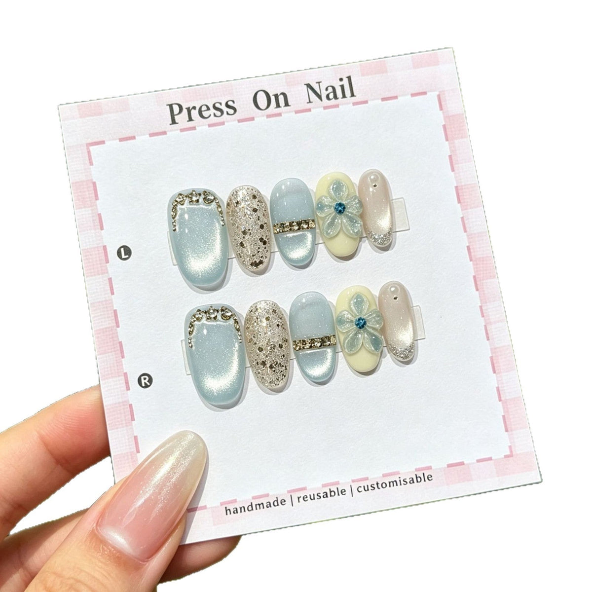 Handgefertigtes Press-on-Nagelset mit floralen Verzierungen und Glitzer