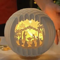 Weihnachtskrippe – beleuchtete Krippenszene aus Papier